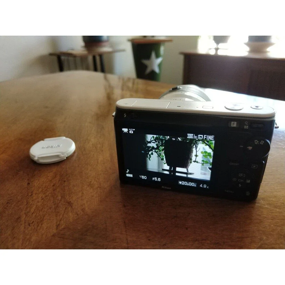READ* Nikon 1 J1 White Digital Camera with 1 NIKKOR 10-30mm VR Lens